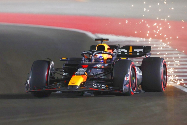 LUSAIL CITY, QATAR - OCTOBER 06: Sparks fly behind Max Verstappen of the Netherlands driving the (1) Oracle Red Bull Racing RB19 during qualifying ahead of the F1 Grand Prix of Qatar at Lusail International Circuit on October 06, 2023 in Lusail City, Qatar. (Photo by Clive Rose/Getty Images)